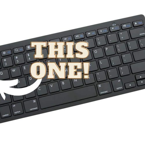 A black keyboard with a large arrow highlighting the Caps Lock key, labelled THIS ONE! in bold text.